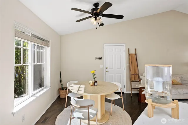 a view of a dining room with furniture window and outside view