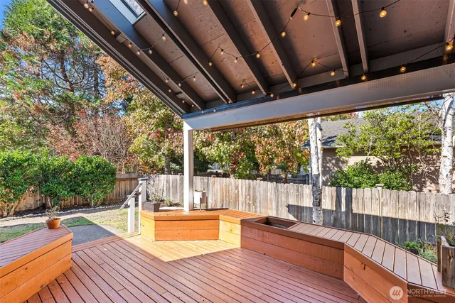 a view of sitting area with furniture and wooden floor
