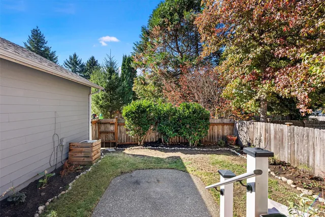 a view of backyard of a house