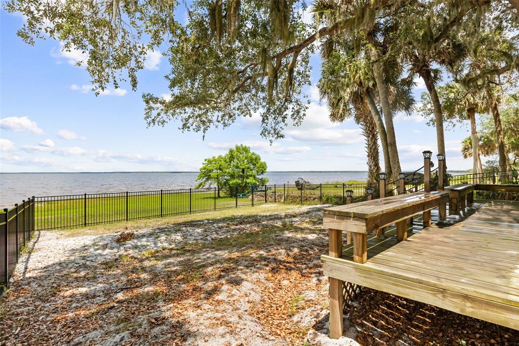 2462 Fort Lane Road Geneva, FL 32732 - Photo 22 of 31 a view of a backyard with a large tree