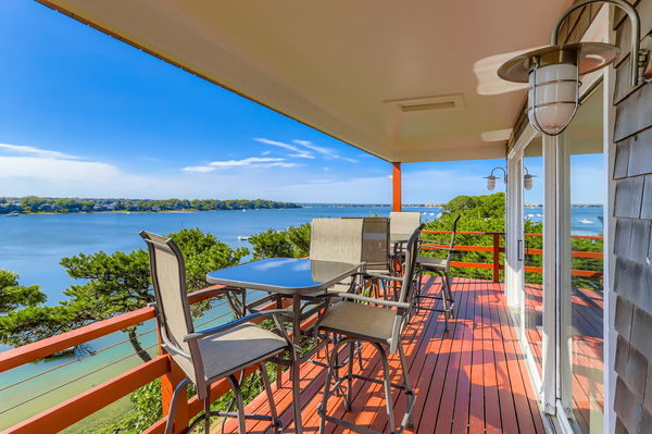 217 Barnes Road Oak Bluffs, MA 02557 - Photo 7 of 60 a view of a chairs and table in patio