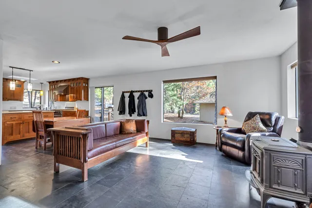 a bedroom with a bed and a book shelf