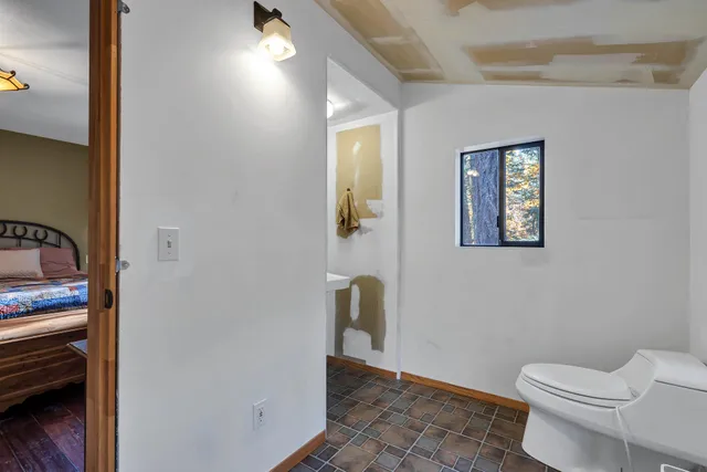 a bathroom with a sink vanity and a mirror
