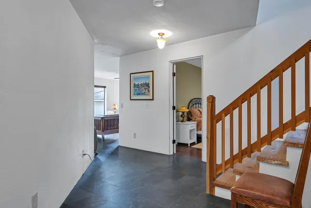 a bathroom with a shower and a toilet