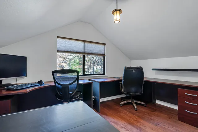 a bedroom with furniture and a window