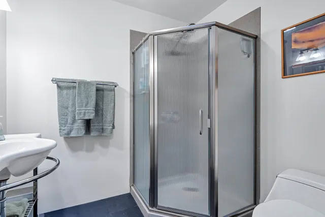 a view of balcony with wooden floor