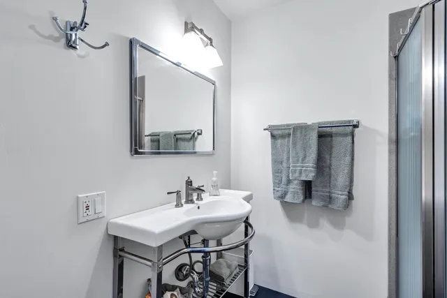 a view of a barn in the middle of a yard