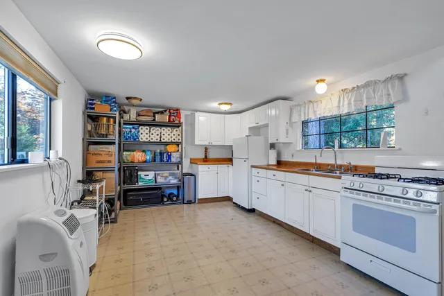 a house with trees in front of it