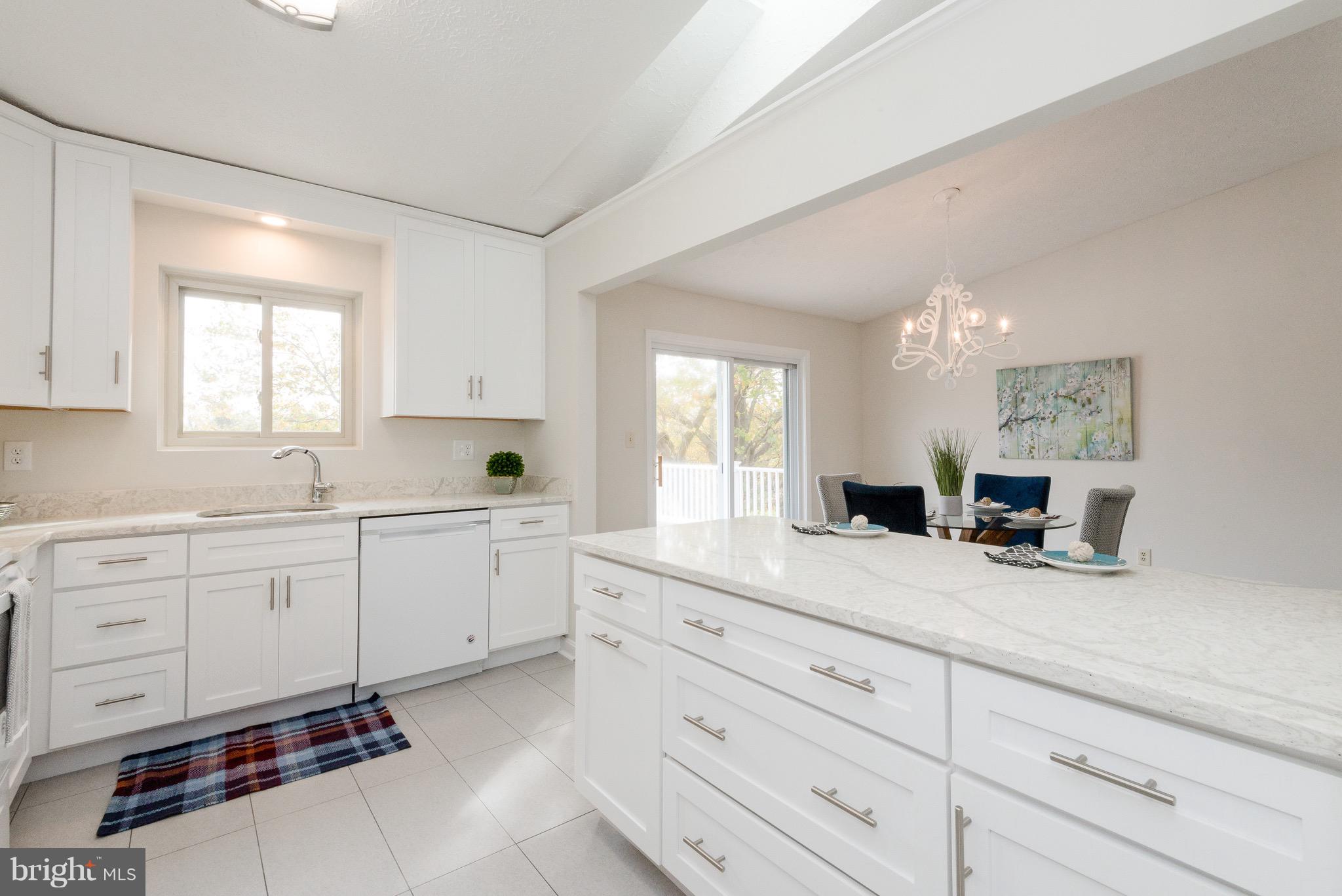 627 Truxton Road Annapolis, MD 21409 - Photo 11 of 48 a kitchen with sink cabinets and window