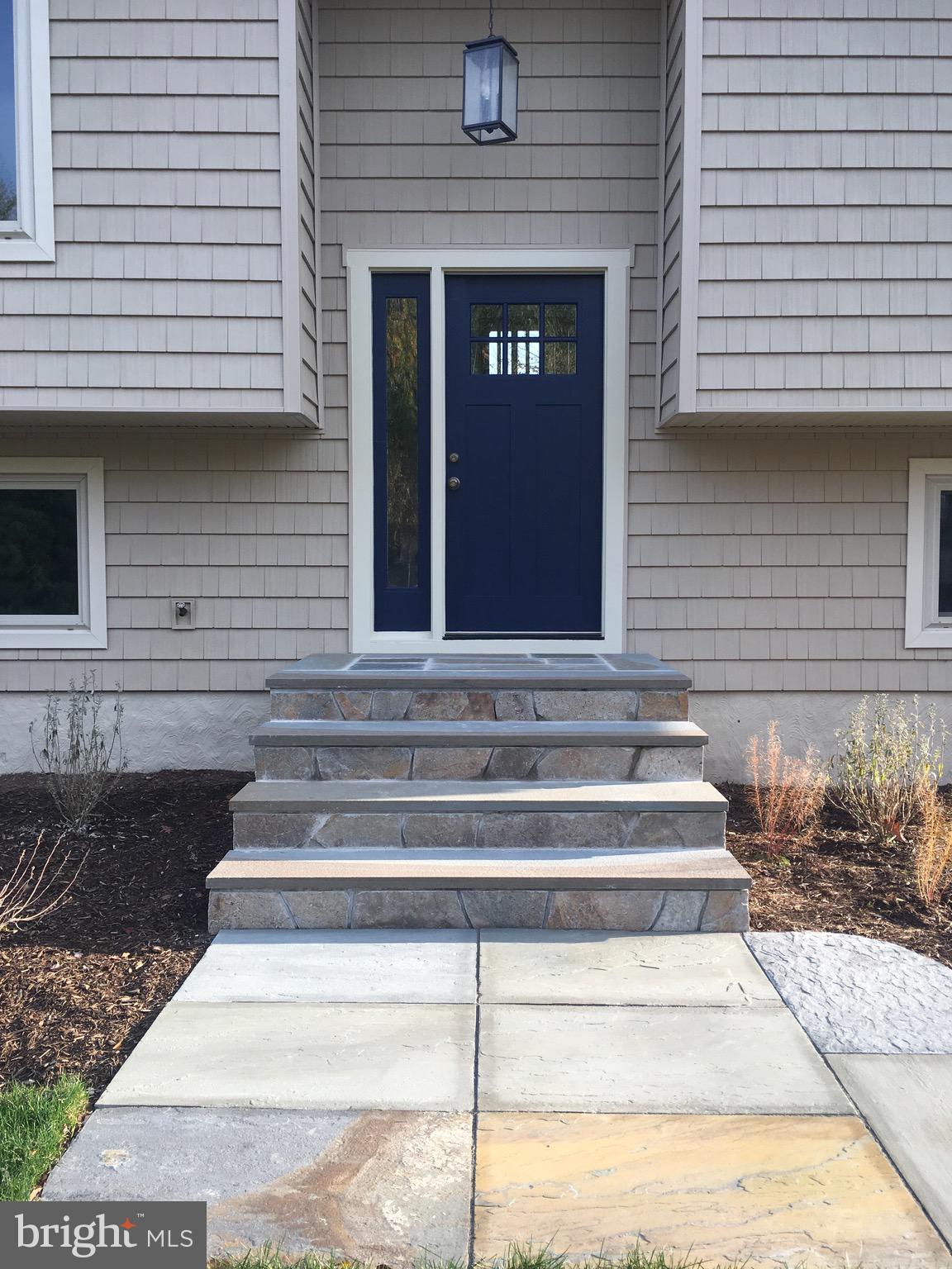 627 Truxton Road Annapolis, MD 21409 - Photo 45 of 48 a front view of a house with stairs