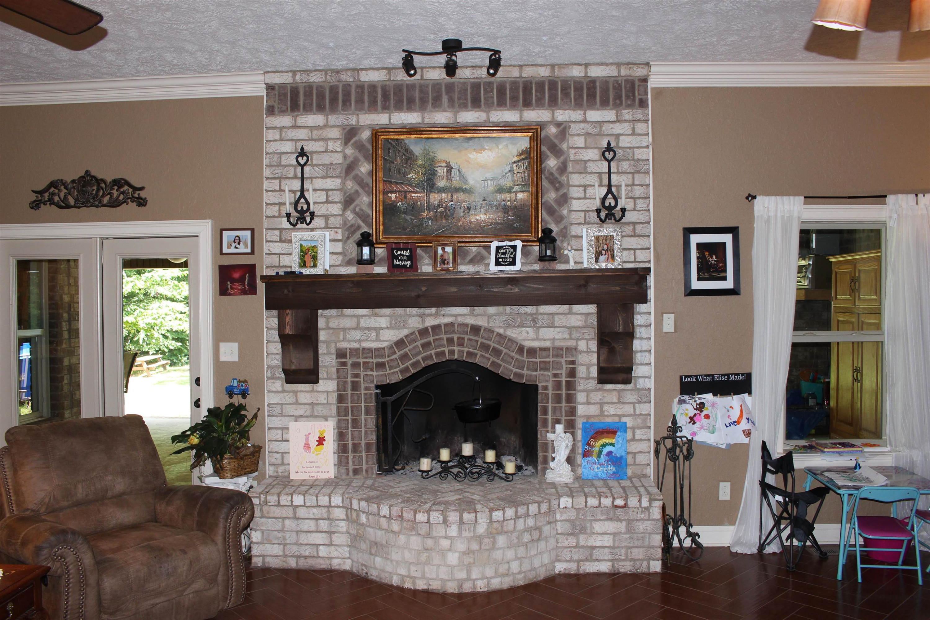 282 Cotton Grove Road Beech Bluff, TN 38313 - Photo 8 of 47 a living room with furniture and a fireplace