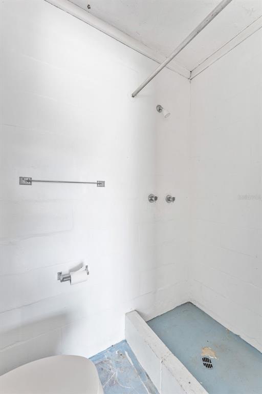 4016 Grayton Drive New Port Richey, FL 34652 - Photo 23 of 40 a bathroom with a tub and shower