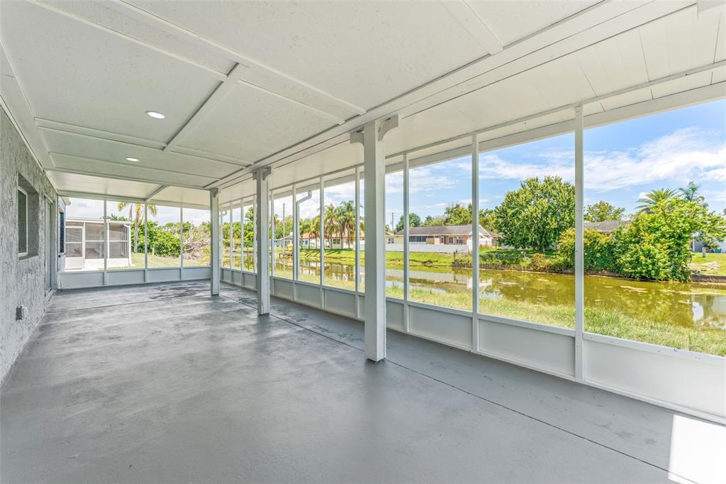 4016 Grayton Drive New Port Richey, FL 34652 - Photo 25 of 40 a view of an empty room with a large window with yard