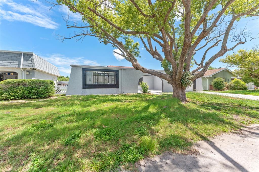 4016 Grayton Drive New Port Richey, FL 34652 - Photo 3 of 40 a sign that is sitting in front of a house