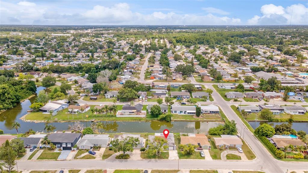 4016 Grayton Drive New Port Richey, FL 34652 - Photo 38 of 40 an aerial view of residential houses with outdoor space