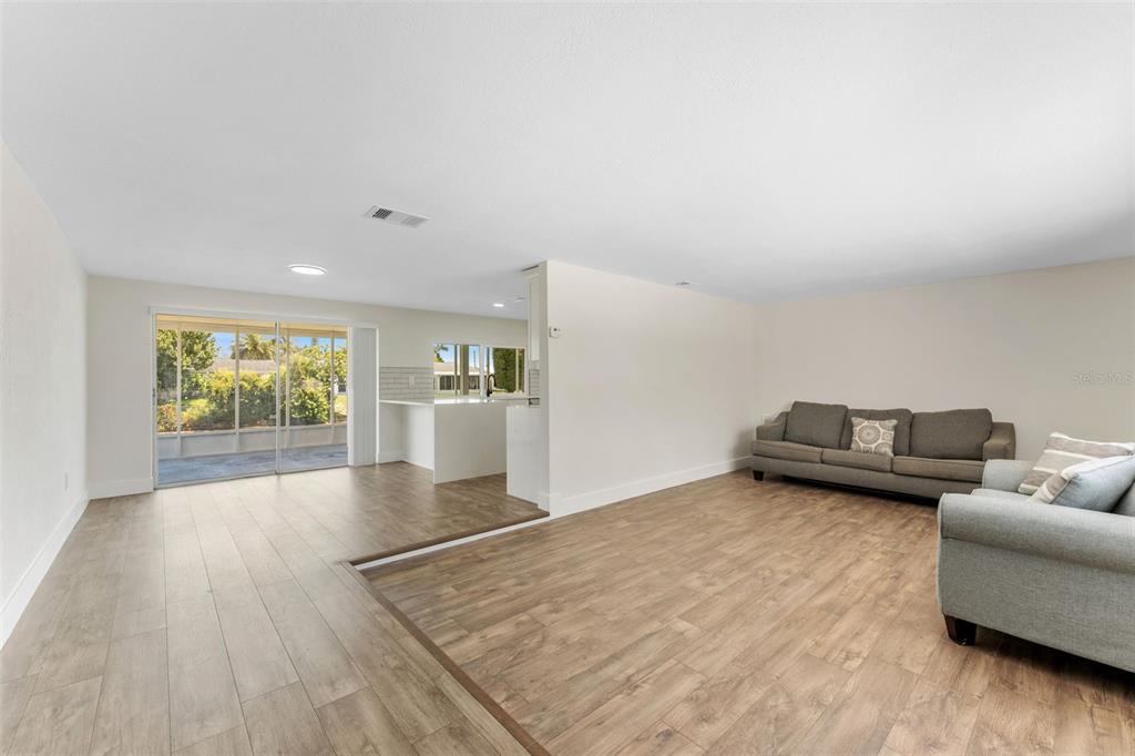 4016 Grayton Drive New Port Richey, FL 34652 - Photo 6 of 40 a living room with furniture and a large window