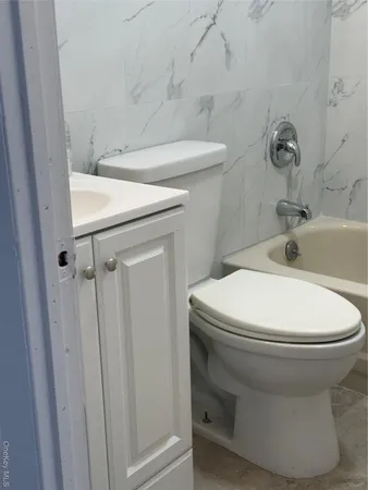 a bathroom with a sink and a toilet