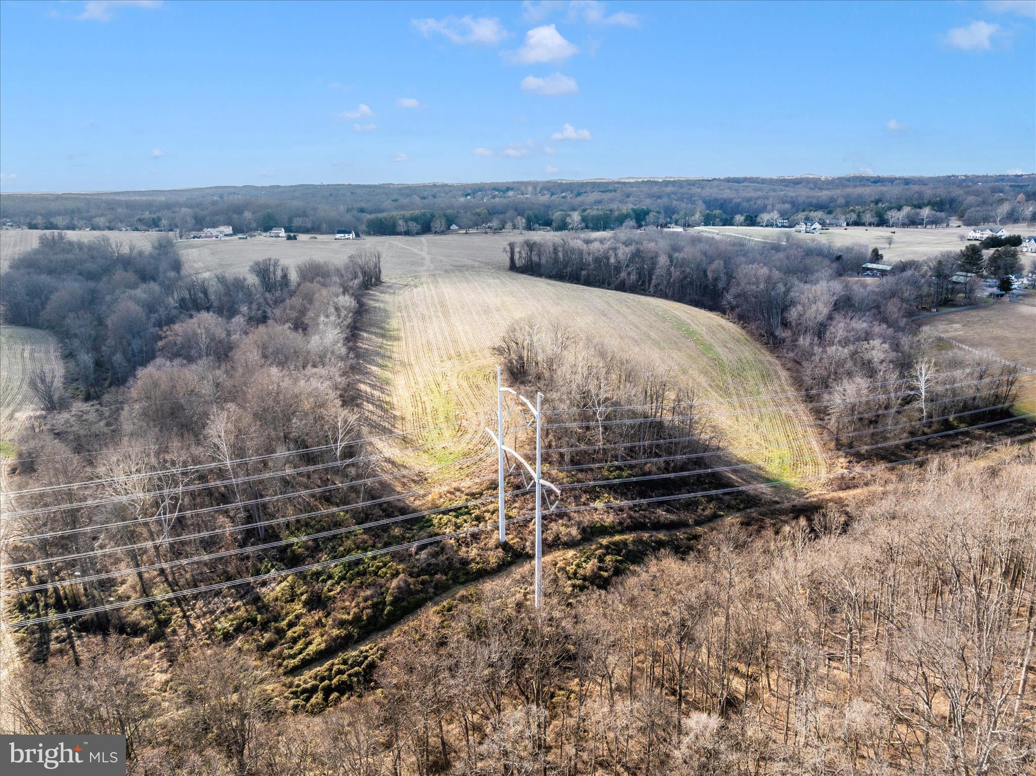 114 Acres On Damascus Road Gaithersburg, MD 20882 - Photo 17 of 25 a view of a dry yard with wooden fence