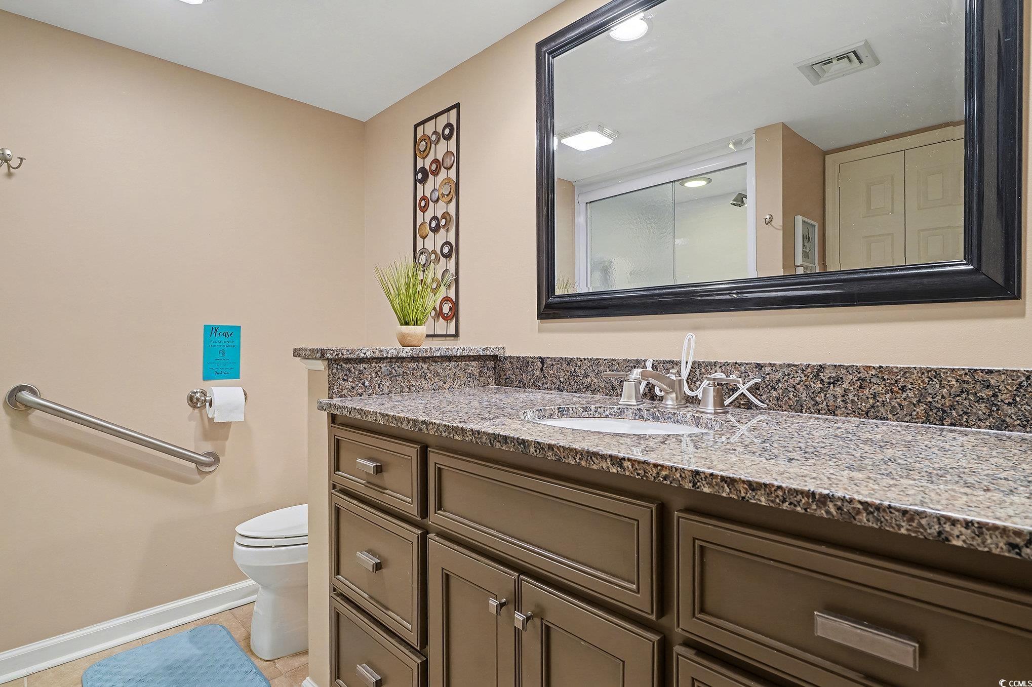 9650 Shore Drive, Unit 1507 Myrtle Beach, SC 29572 - Photo 19 of 39 Full bath with vanity, light tile patterned floors, and recessed lighting