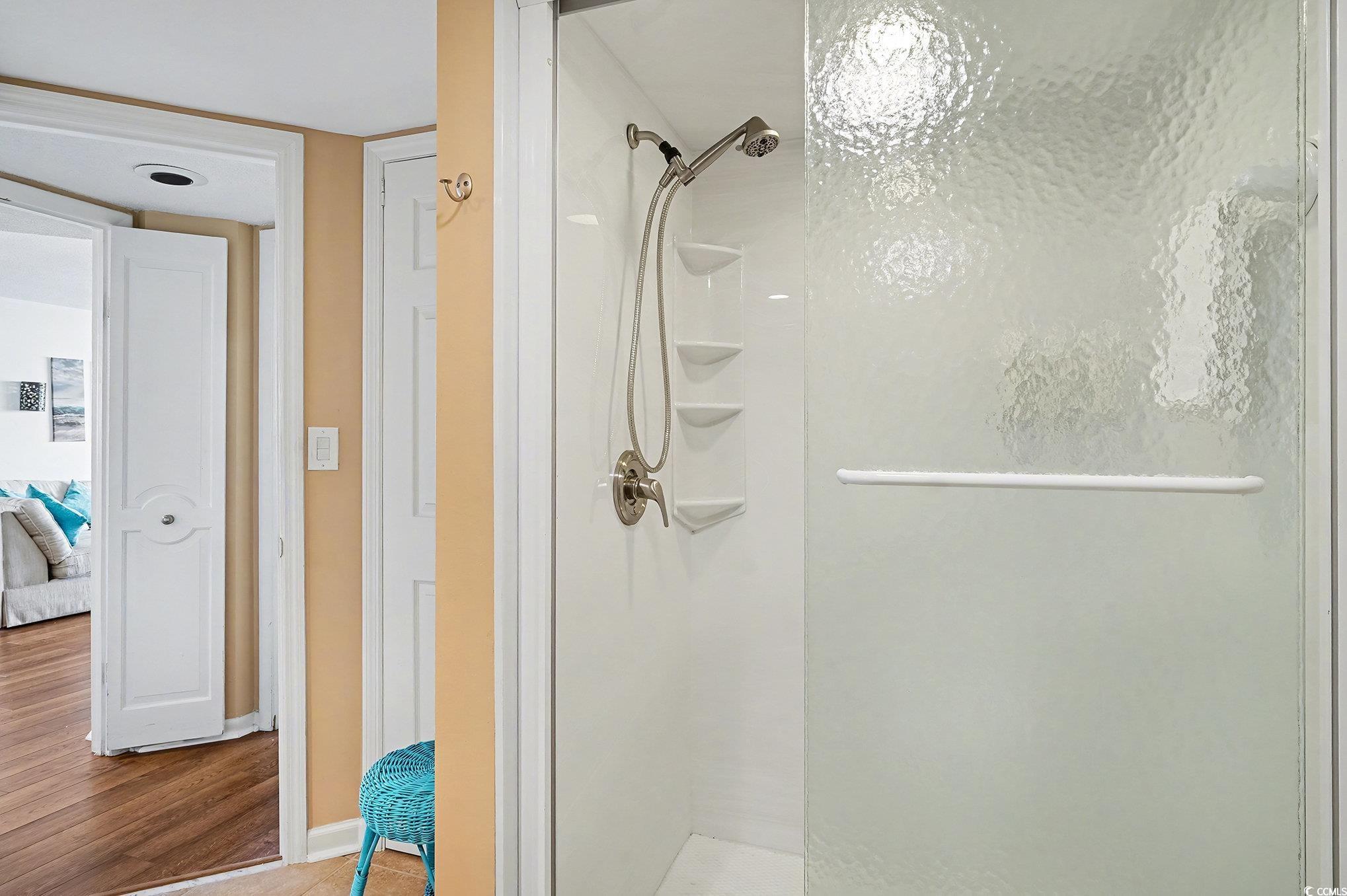 9650 Shore Drive, Unit 1507 Myrtle Beach, SC 29572 - Photo 20 of 39 Ensuite bathroom featuring a shower stall