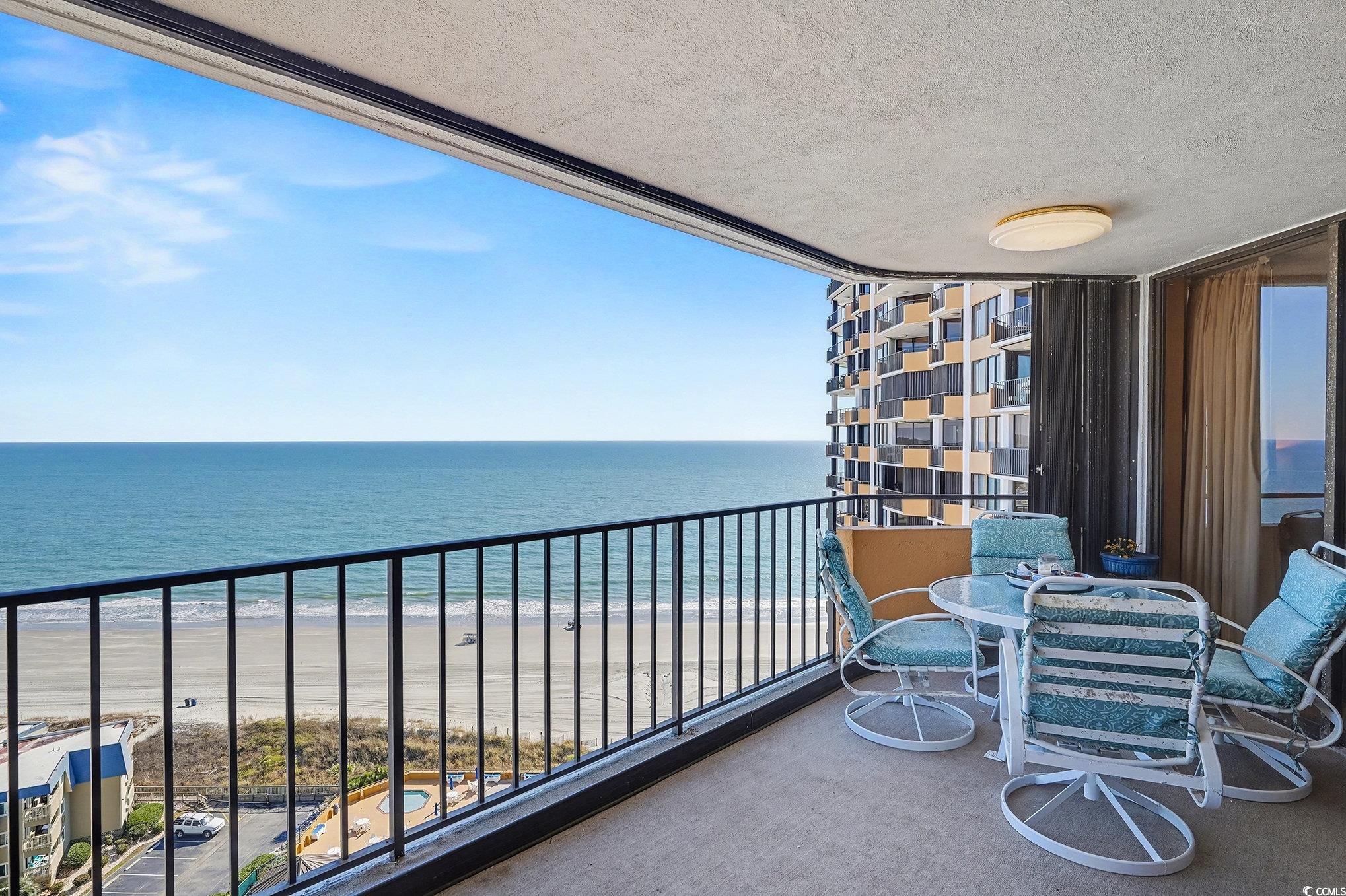 9650 Shore Drive, Unit 1507 Myrtle Beach, SC 29572 - Photo 24 of 39 Balcony featuring view of water and beach