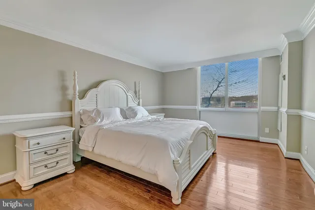 a bedroom with a bed and closet