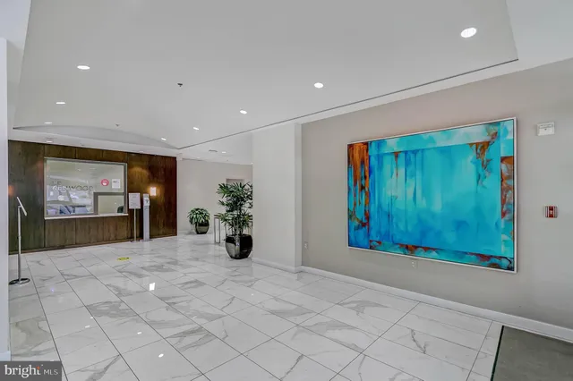 a view of a hallway with closet