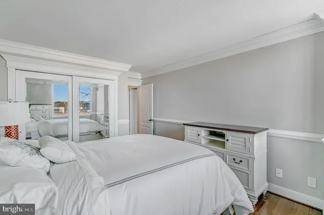 a bathroom with a sink a mirror and a shower