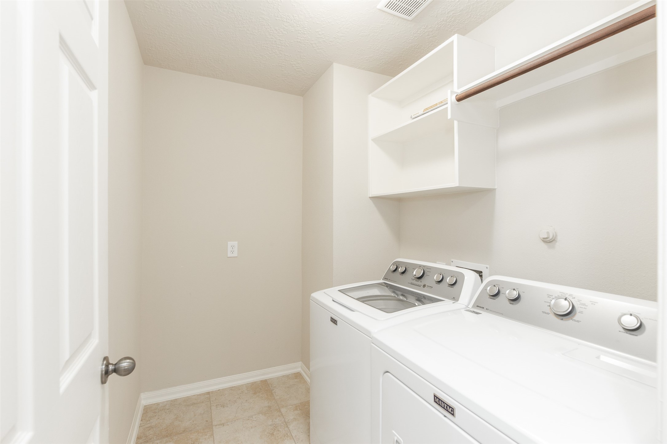 25919 Pebble Terrane Lane Katy, TX 77494 - Photo 28 of 28 a utility room with dryer and washer