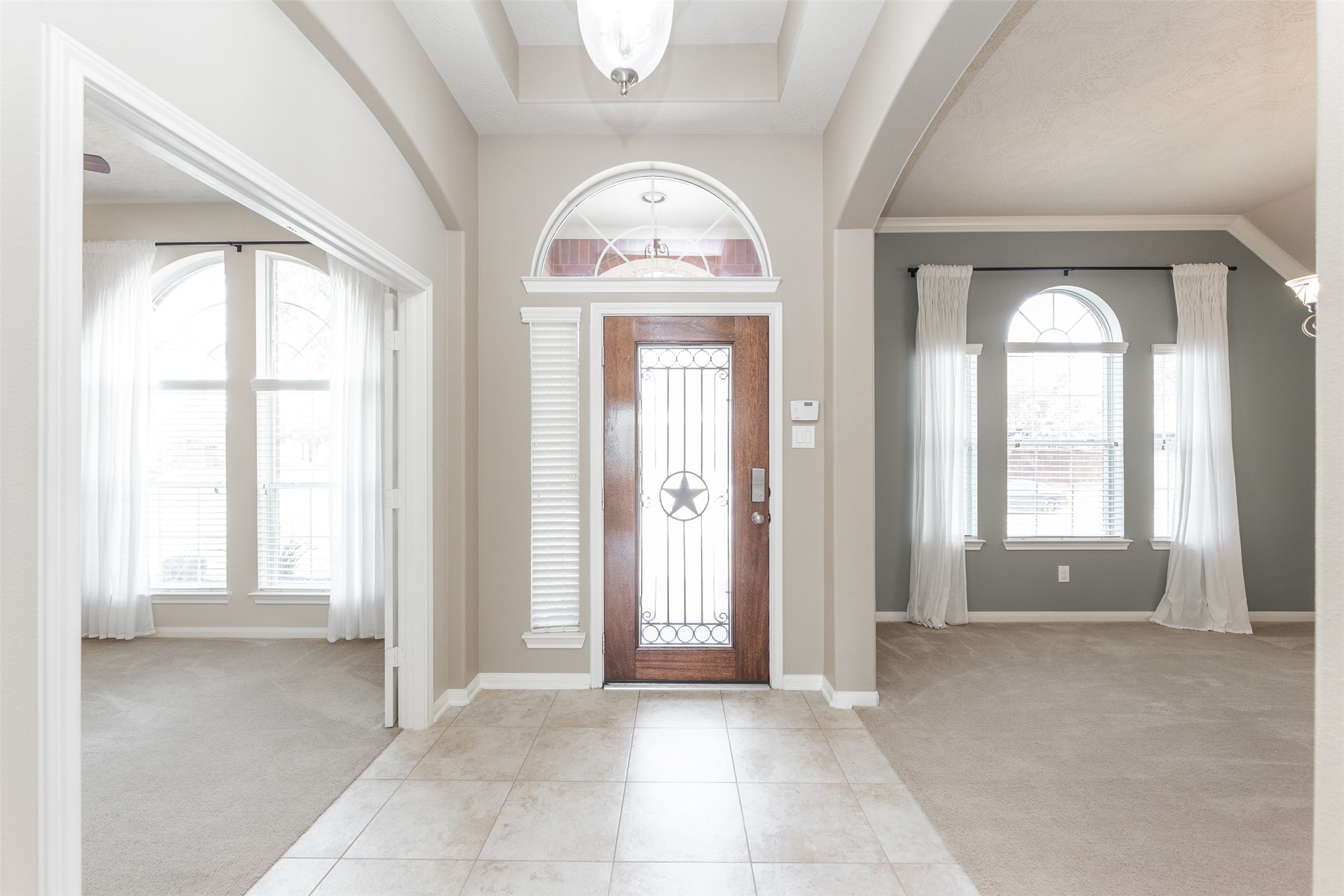 25919 Pebble Terrane Lane Katy, TX 77494 - Photo 5 of 28 a view of an empty room with window and bathroom