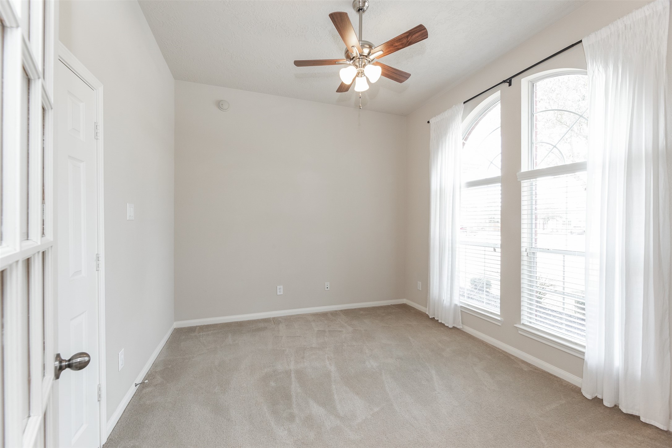 25919 Pebble Terrane Lane Katy, TX 77494 - Photo 7 of 28 a view of an empty room with a window