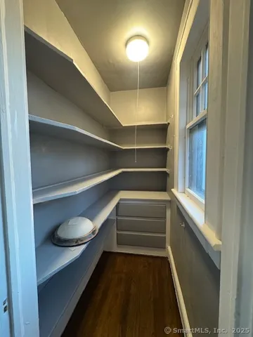 a view of an empty walk in closet