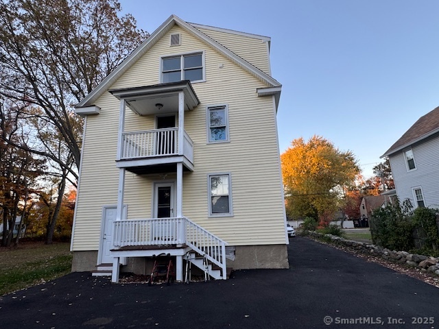 463 Highland Avenue Stratford, CT 06614 - Photo 13 of 14 a front view of a house with a yard