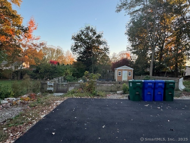 463 Highland Avenue Stratford, CT 06614 - Photo 14 of 14 a view of a red house with a yard