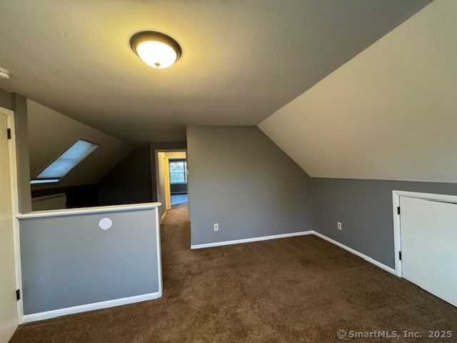 463 Highland Avenue Stratford, CT 06614 - Photo 8 of 14 a view of an empty room with wooden floor