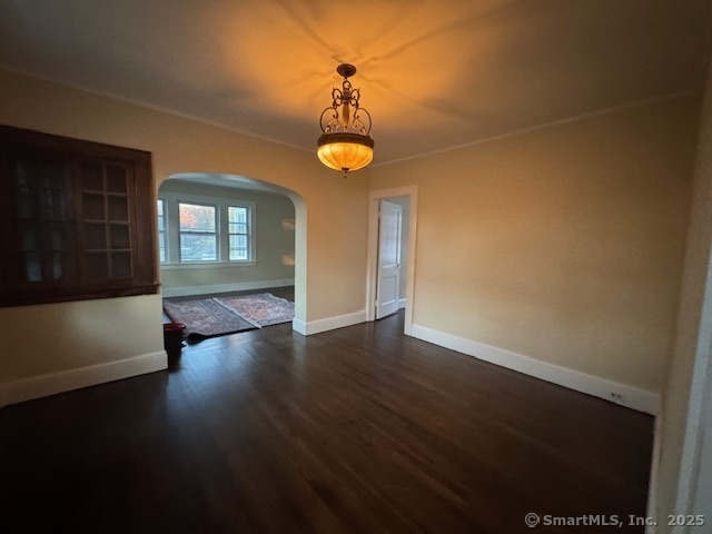 463 Highland Avenue Stratford, CT 06614 - Photo 9 of 14 a view of an empty room with wooden floor and a window