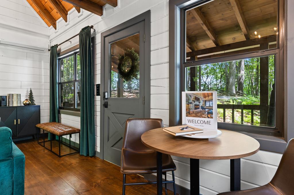 125 Taylor Ridge Road Blue Ridge, GA 30513 - Photo 29 of 29 a view of a dining room with furniture window and outside view