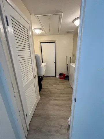 a view of a livingroom from a hallway