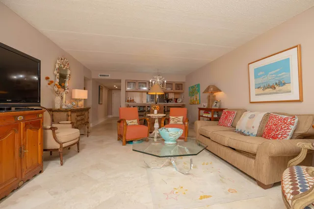 a view of a chairs and table in a room