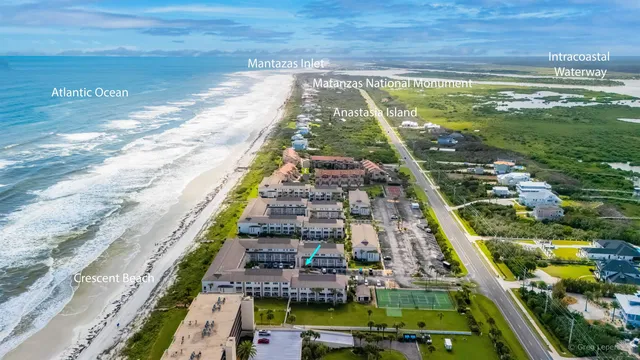 a dining room with a table and chairs