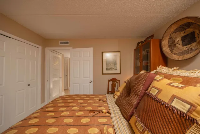 a front view of a house with a yard table and chairs