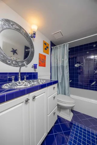 a view of swimming pool with outdoor seating