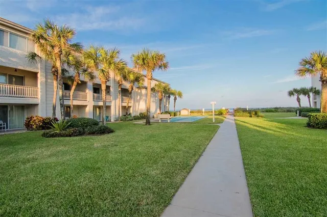 a view of a city with an ocean view
