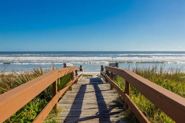 a view of an outdoor space and tennis court