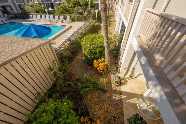a view of a hallway with staircase