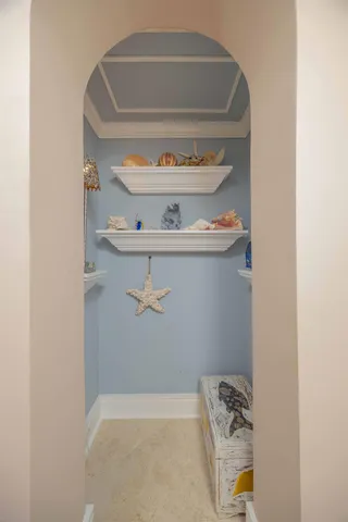 a kitchen with a sink cabinets and window