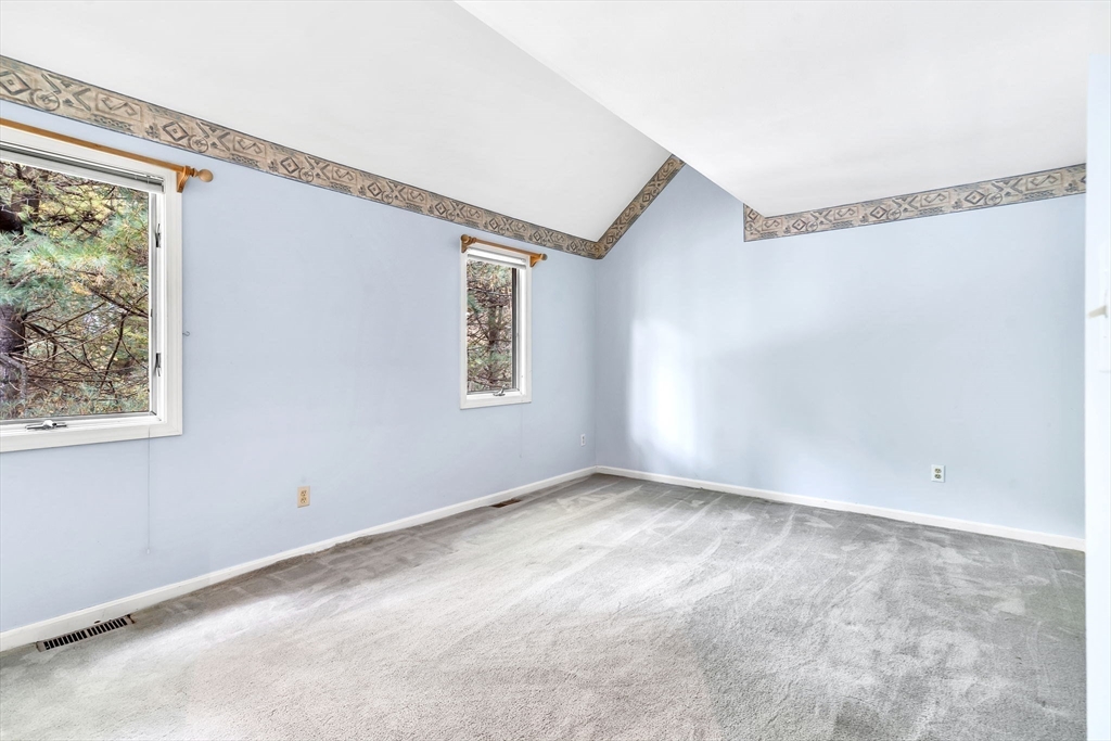 4 Country Meadow Road, Unit 4 Haverhill, MA 01832 - Photo 12 of 29 a view of an empty room with a window