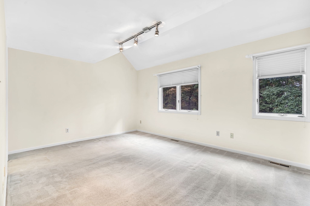 4 Country Meadow Road, Unit 4 Haverhill, MA 01832 - Photo 15 of 29 an empty room with windows