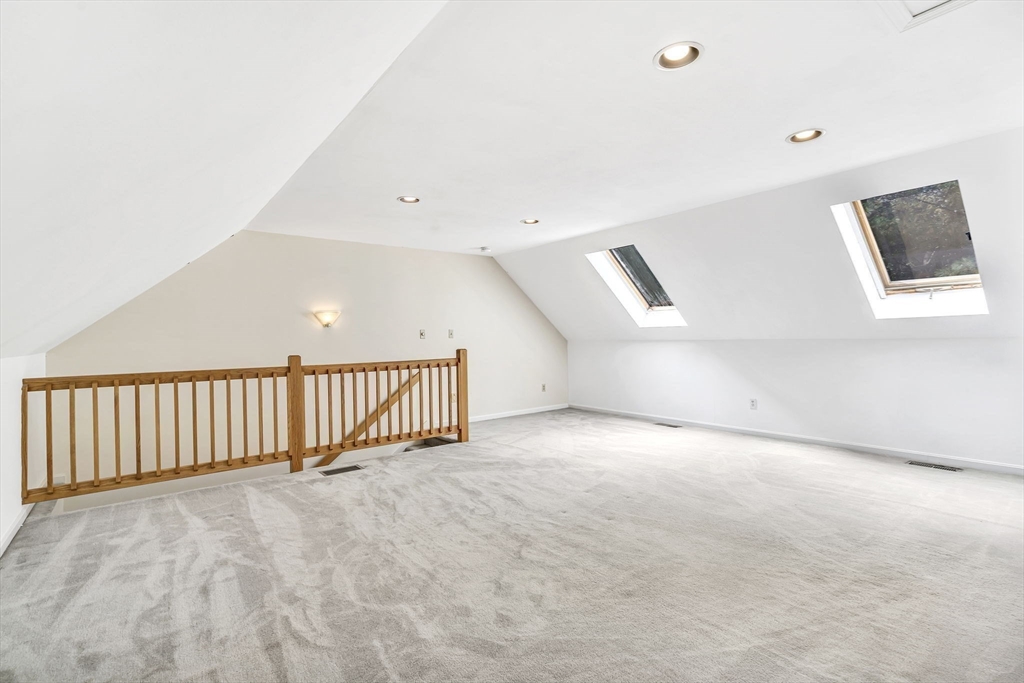 4 Country Meadow Road, Unit 4 Haverhill, MA 01832 - Photo 20 of 29 a view of an empty room with a window