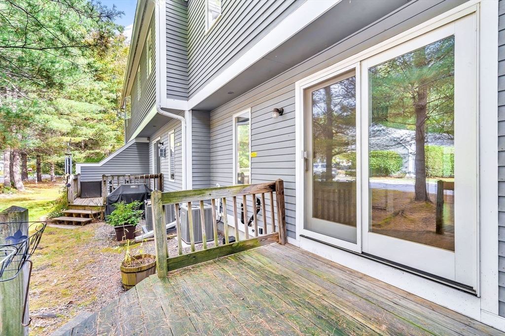 4 Country Meadow Road, Unit 4 Haverhill, MA 01832 - Photo 3 of 29 a view of porch with seating space